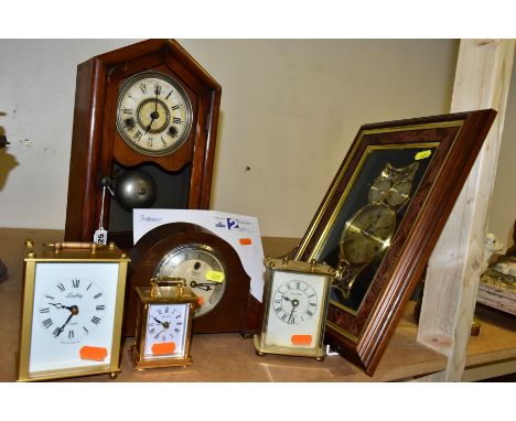 SIX CLOCKS, comprising a late Victorian mantel clock marked 'ST' on the face, with two winding holes, pendulum and key, (in n