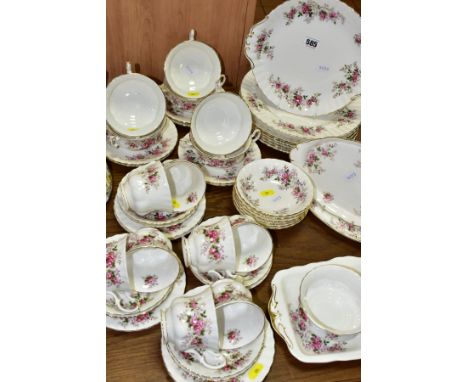 ROYAL ALBERT LAVENDER ROSE PART DINNER SERVICE comprising eight cups and saucers (five cups with some internal crazing and st