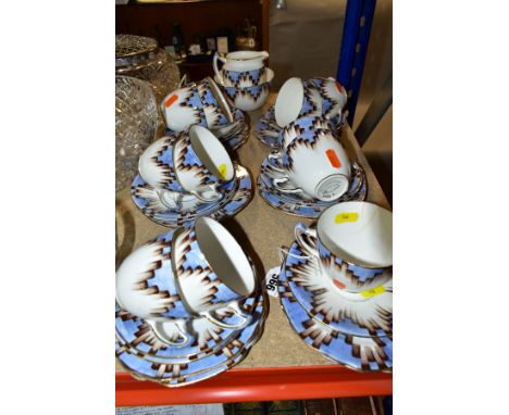 AN ART DECO PART TEASET, comprising eleven cups and saucers, twelve side plates, milk jug and sugar bowl (Condition report:-t