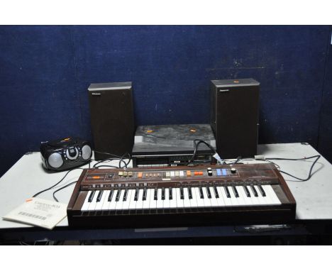 A VINTAGE CASIOTONE 403 KEYBOARD with rosewood effect case along with stand and manual, a vintage Panasonic SG-X10 and speake