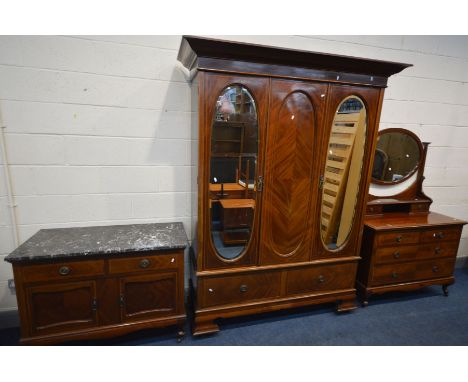 AN EDWARDIAN MAHOGANY AND BOX INLAID THREE PIECE BEDROOM SUITE, comprising a mirrored double door wardrobe, above two drawers