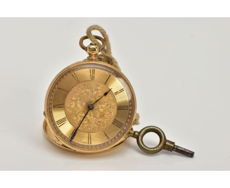 A YELLOW METAL OPEN FACE POCKET WATCH, round gold dial, with a floral engraved design, Roman numerals, blue hands, within an 