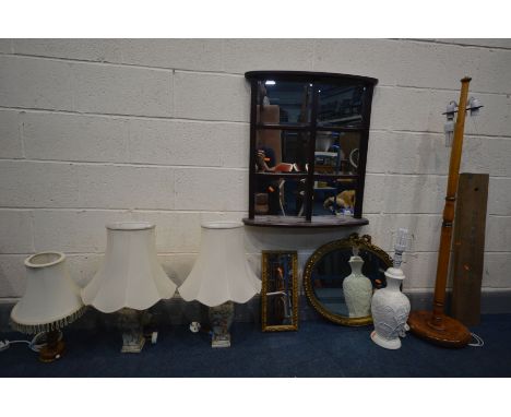 A PAIR OF MARBLIZED CERAMIC TABLE LAMPS, two other table lamps and a standard lamp, all with shades, along with a gilt framed