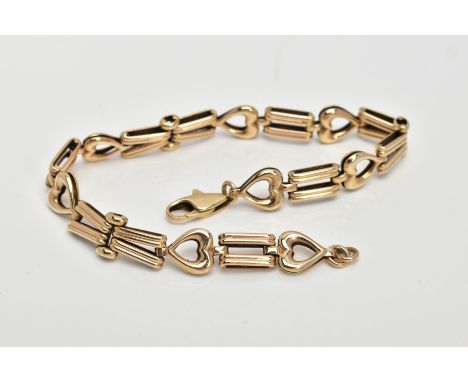 A 9CT GOLD BRACELET, designed with textured tapered links interspaced with openwork heart links, fitted with a lobster claw c