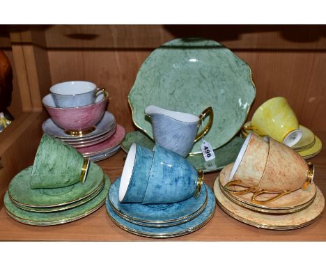 A QUANTITY OF ROYAL ALBERT HARLEQUIN GOSSAMER PATTERN TEA WARES, comprising two bread and butter plates, a milk jug, sugar bo