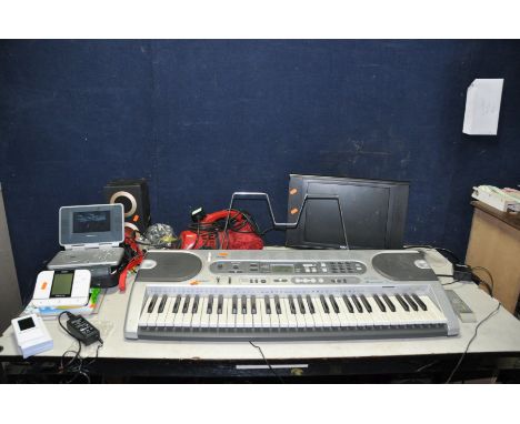 A COLLECTION OF HOUSEHOLD ELECTRICALS including a Proline portable DVD player, a Dirt Devil handheld vacuum, Casio LK-70s key