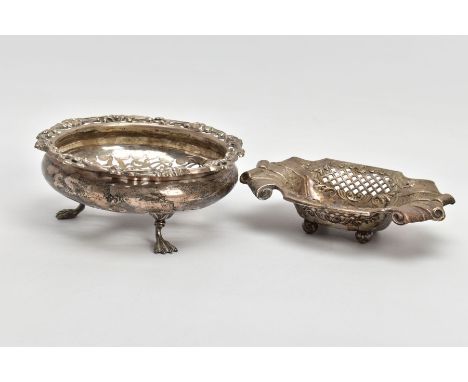 TWO SILVER DISHES, the first of a circular pierced form, decorated with scrolls and flowers, raised on three talon feet, hall