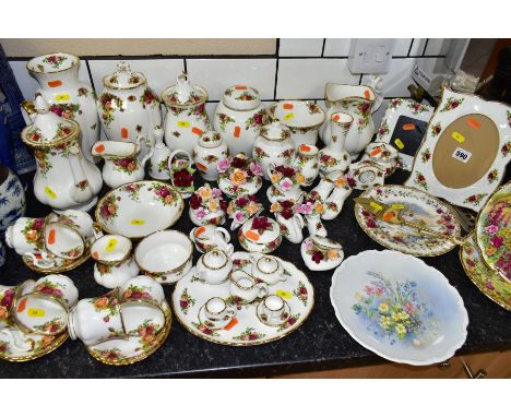 ROYAL ALBERT OLD COUNTRY ROSES CERAMICS to include covered storage jars, coffee pot, six cups and saucers, two milk jugs, sug