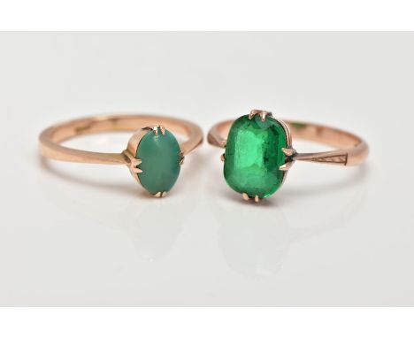 TWO YELLOW METAL DRESS RINGS, the first designed with a rounded rectangular green stone assessed as paste, tapered shoulders,