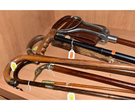 SIX VARIOUS WALKING STICKS, a shooting stick and a Bloxham School O.T.C Swaggar stick, two of the walking sticks have hallmar