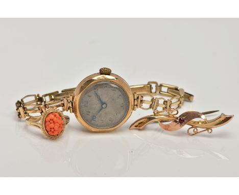 A LADY’S 9CT GOLD WRISTWATCH, A 9CT GOLD RING AND BROOCH, the watch with a hand wound movement, round silver engine turned di