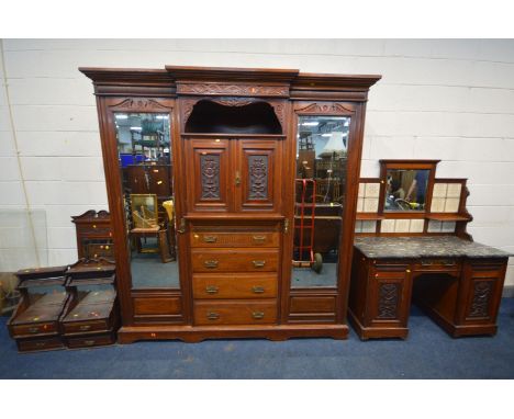 A MAPLE AND CO, EDWARDIAN WALNUT TWO PIECE BEDROOM SUITE comprising a compactum wardrobe, two bevelled mirror doors flanking 