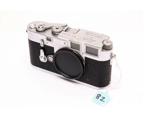 A Leica M3 Rangefinder Body, chrome, serial no. 707620, with various engravings including 'Leitz-Eigentum' and 'Leih-Kamera 2