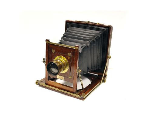 A W. Watson & Sons Whole Plate Mahogany Camera, with Extra Rapid Euryscope Anasgitmag f/6 brass lens, lacking screen