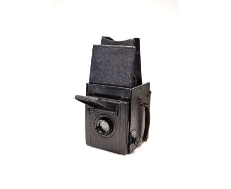 An Unmarked British Reflex Camera, with Dallmeyer Anastigmat f/4.5 6" lens, in maker's case with accessories; ex-Bonhams lot 