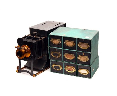 A Black & Brass Magic Lantern, together with a large quantity of magic lantern slides including story screens and church imag