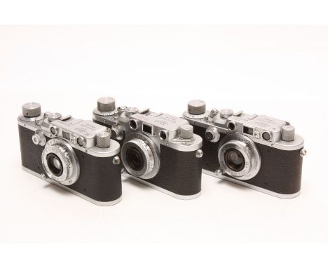 Leica Rangefinder Cameras: three Leica cameras, serial nos. 198905 / 202006 / 435951, each with Leitz lens, with various engr