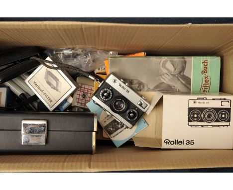 A Rollei 35 Compact Camera, together with other various accessories (a lot)