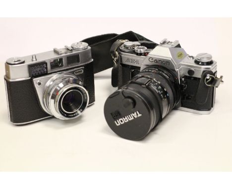 A Canon AE-1 Camera, together with a Kodak Retinette IIA (2)