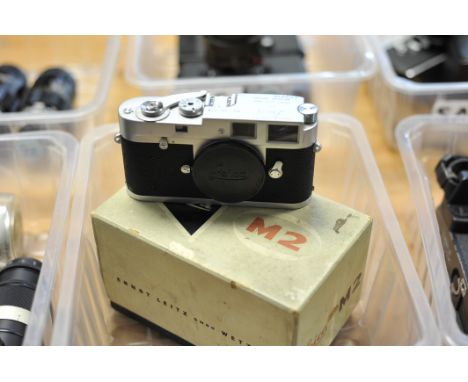 A Leica M2 Rangefinder Body, chrome, serial no. 975564, with various engravings including 'Camera Assembled in Canada' and 'B
