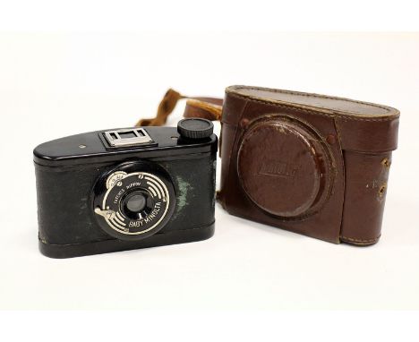 A Baby Minolta Bakelite Camera, with Nippon lens, in maker's case