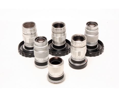Various Leitz Lenses: quantity of five Leitz f/4 90mm lenses, all with various engravings including 'Leitz-Eigentum', 'Eigent