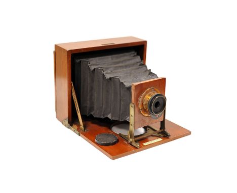 A J. Lancaster & Sons Mahogany Box Camera, with unmarked rotary Waterhouse-stop brass lens, damage to lens bed