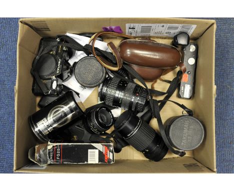 A Pentax MX SLR Camera, black body together with 75-150 and 28-80 Takumar zoom lenses and other items (a lot)
