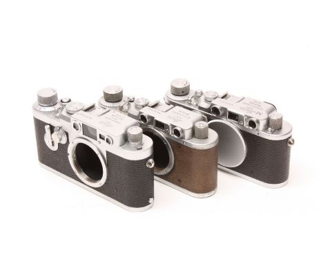 Leica Rangefinder Bodies: three Leica bodies, serial nos. 207484 / 351012 / 971934, with various engravings including 'M Artl