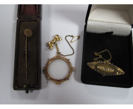 A Victorian Brooch, with bead and rope twist detail with glazed locket back verso, stamped "15ct"; together with a stick pin,