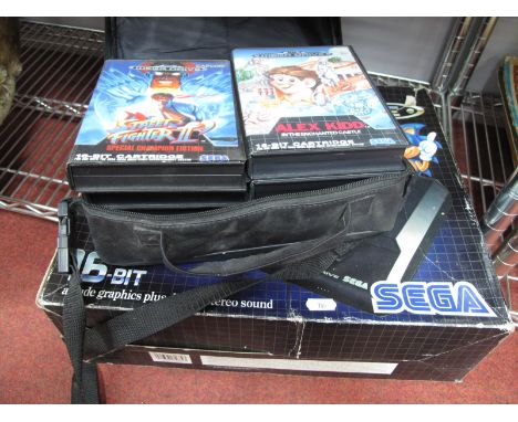 Sega Mega Drive Console, (boxed) and eight games.
