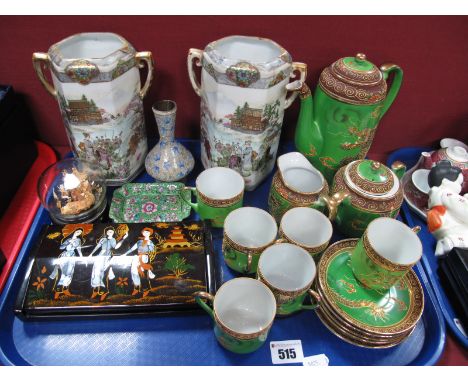 A Pair of Noritake Hexagonal Vases, each featuring garden scene with figures and pagoda, twin gilt handles 18cm high (one cra