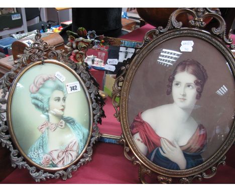 A Square Shaped Barbola Mirror, with ribbon and rose detail border; together with two oval portrait prints in ornate brass fr