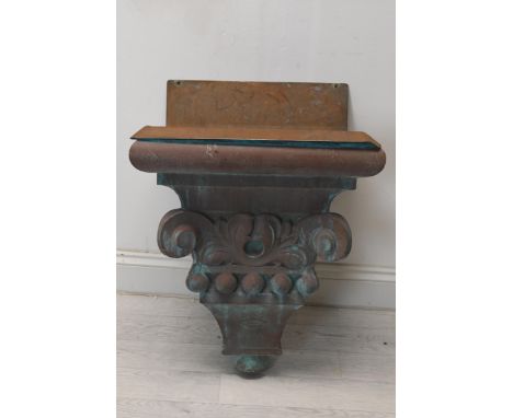 A moulded downpipe hopper in the form of a classical corbel with fitted copper sink insert. H.72 W.50 D.33 