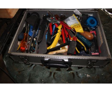 An aluminium case and contents of various hand tools