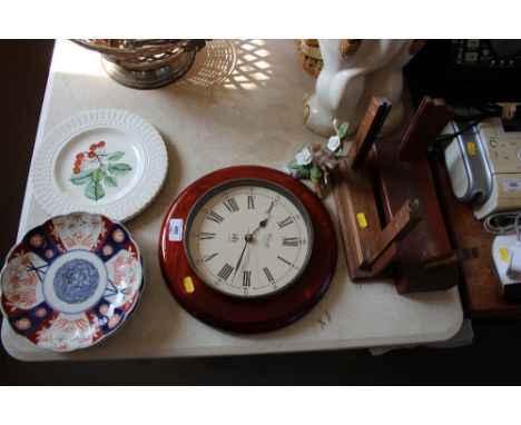 An Art Deco photo frame; decorative plates; wall clock etc