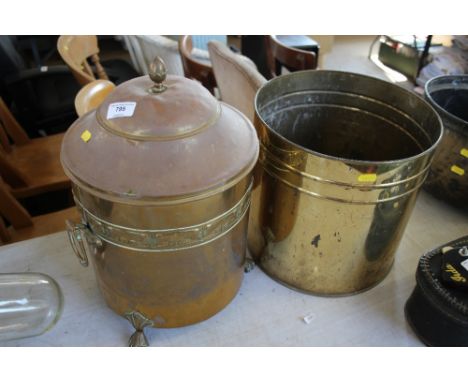 A brass coal bucket raised on paw feet; together with a brass planter