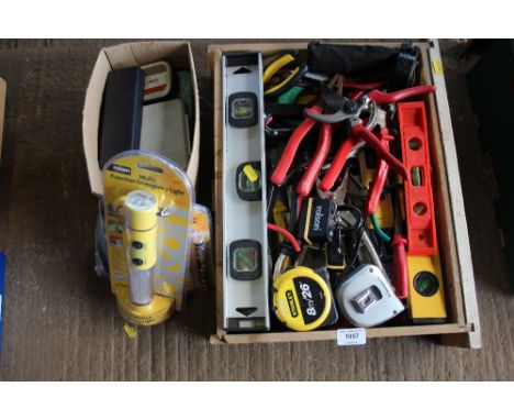 A drawer of various hand tools 