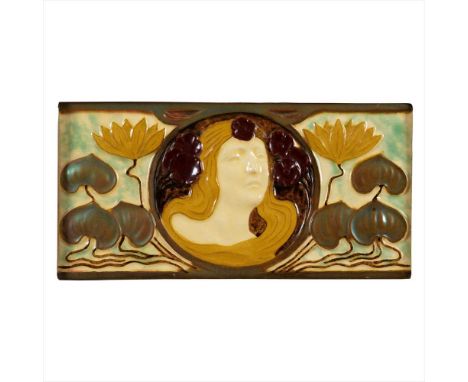 ZSOLNAY, PECS ART NOUVEAU TILE, CIRCA 1905 depicting a fair haired maiden, surrounded by lily pads, eosin glazed earthenware 