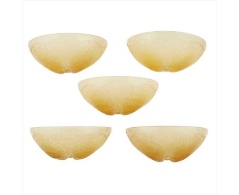 RENÉ LALIQUE (1860-1945) SET OF FIVE 'COQUILLES' GLASS WALL APPLIQUES/ SHADES, INTRODUCED 1924 pale amber glass, each with wh