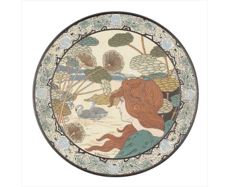 CHARLES RENÉ THÉVENI FOR VILLEROY &amp; BOCH LARGE 'METTLACH' EARTHENWARE CHARGER, CIRCA 1890 depicting an Art Nouveau maiden