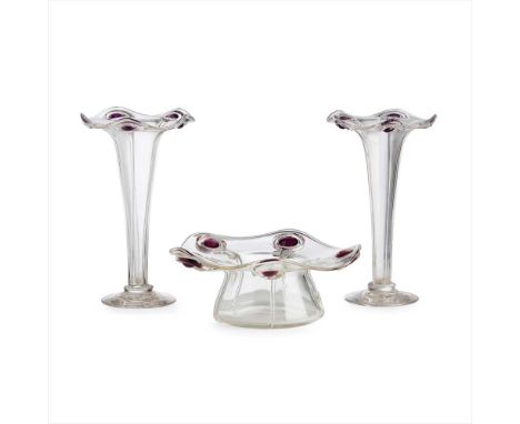 STUART &amp; SONS, STOURBRIDGE PAIR OF ART NOUVEAU 'CAIRNGORM' AMETHYST STEM VASES, CIRCA 1910 with wavy rims and applied ame