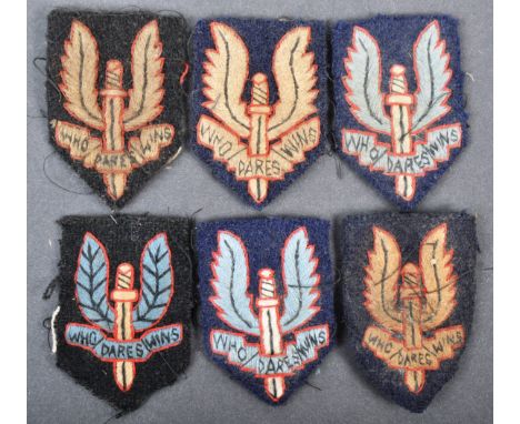 A collection of WWII Second World War type British SAS Special Air Service cloth uniform / cap patches. Varying forms - but e