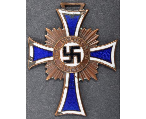 An original WWII Second World War Third Reich German Nazi ' Mothers Cross ' Cross Of Honour Of The German Mother medal. Ename