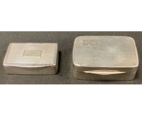 A George V rounded rectangular snuff box, engine turned cover, Birmingham 1930;  another smaller Birmingham 1972, 56.9g gross