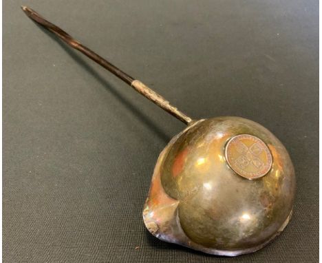 A George III silver toddy ladle, inset with coin, whale bone handle, 35cm long, c.1760 