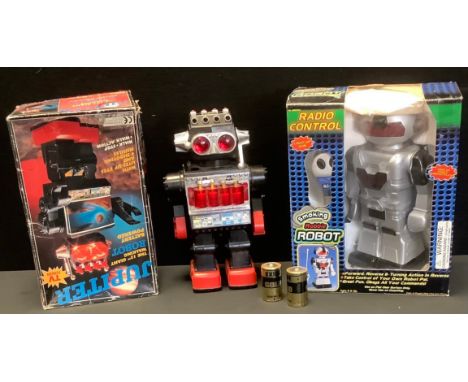 A Jupiter walking Robot, boxed;  Smoking Robbie radio control robot, boxed;  another robot unboxed (3) 