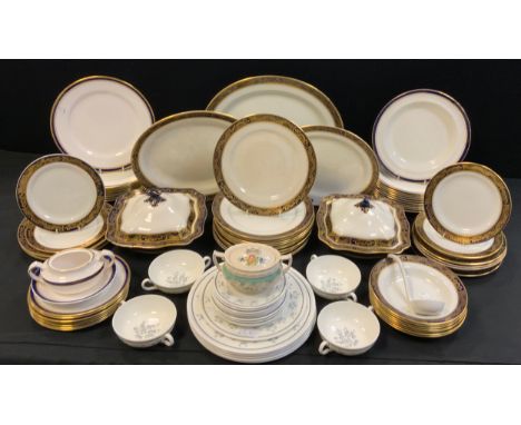 A Solian Ware dinner service, comprising dinner plates, dessert plates, side plates, bowls, graduated serving plates, tureens