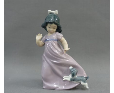 Nao porcelain figure of a girl and her puppy, 17cm high 