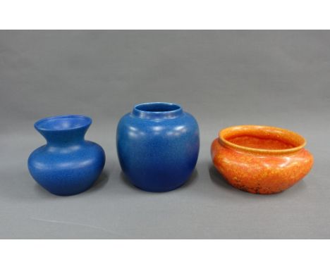 Pilkington Royal Lancastrian pottery to include two mottled blue glazed vases and a mottled orange glazed bowl of lobed form 